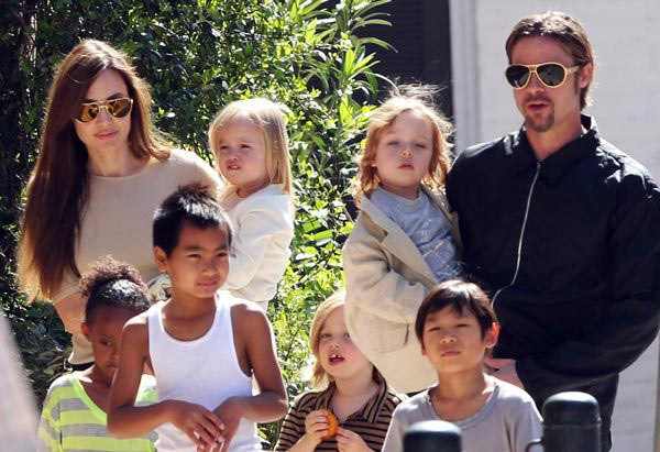 Brad and Angelina out for a walk with their children